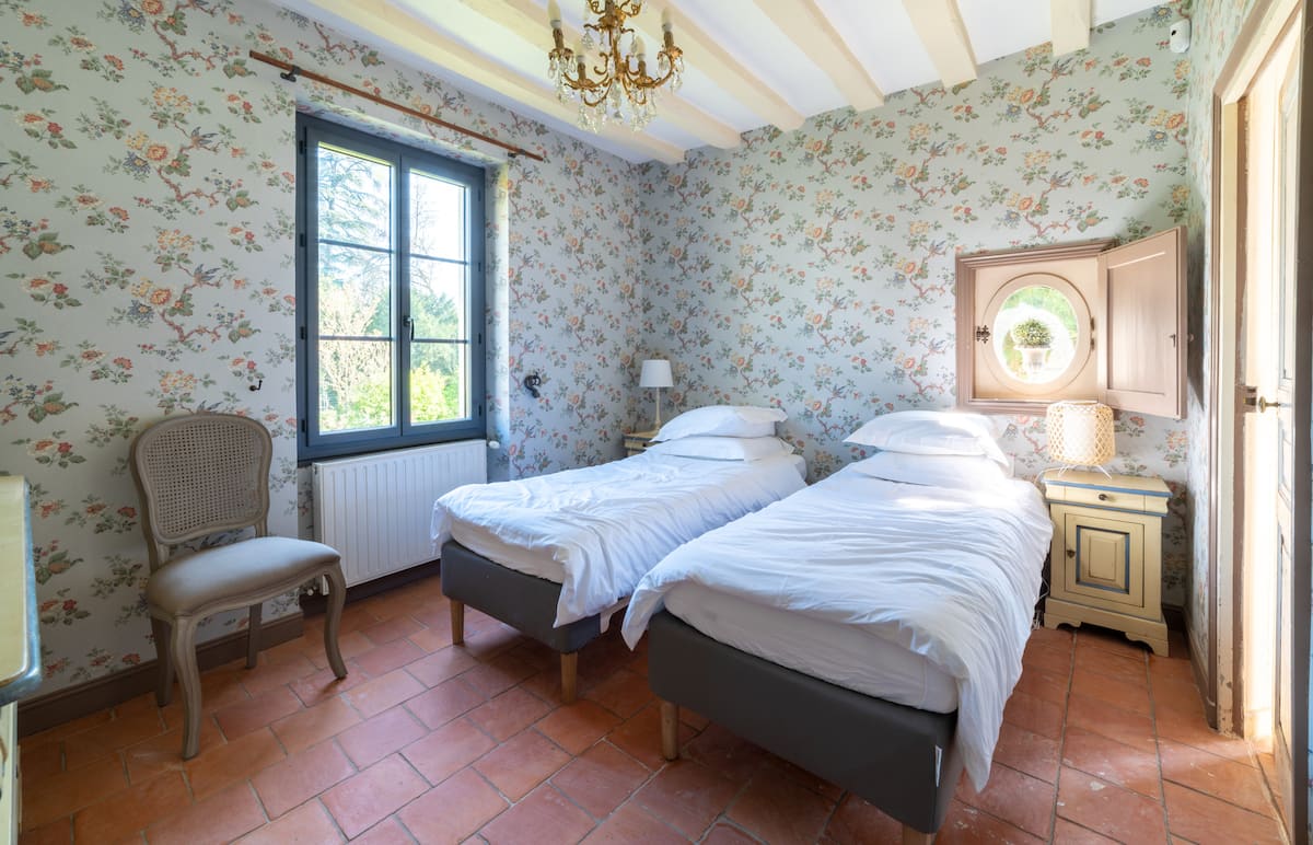 Chambre 1 — RDC maison principale